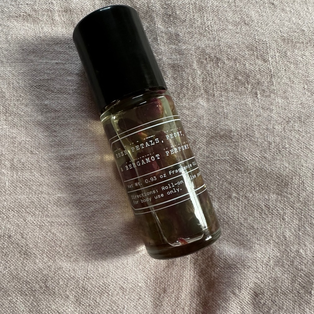 Rose petals, peony and bergamot perfume oil roller. Brand new. Urban outfitters